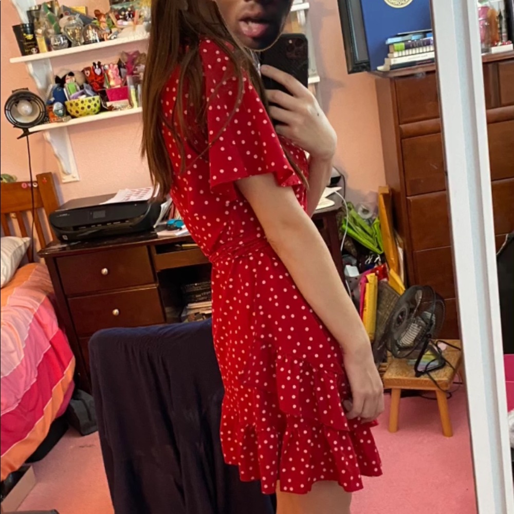 Red wrap dress with pink polka dots.